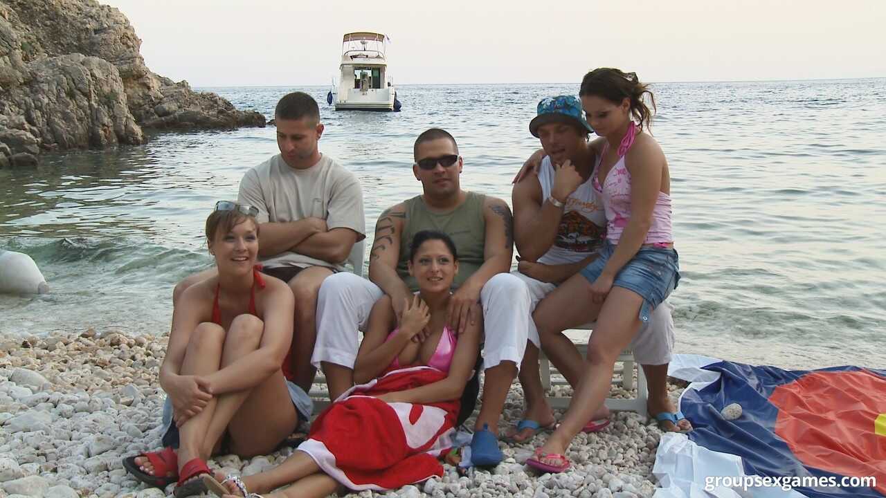 Sizzling Naked Orgy at the Beach Leads to Steamy DP Action and Big-Titted Threesome - 