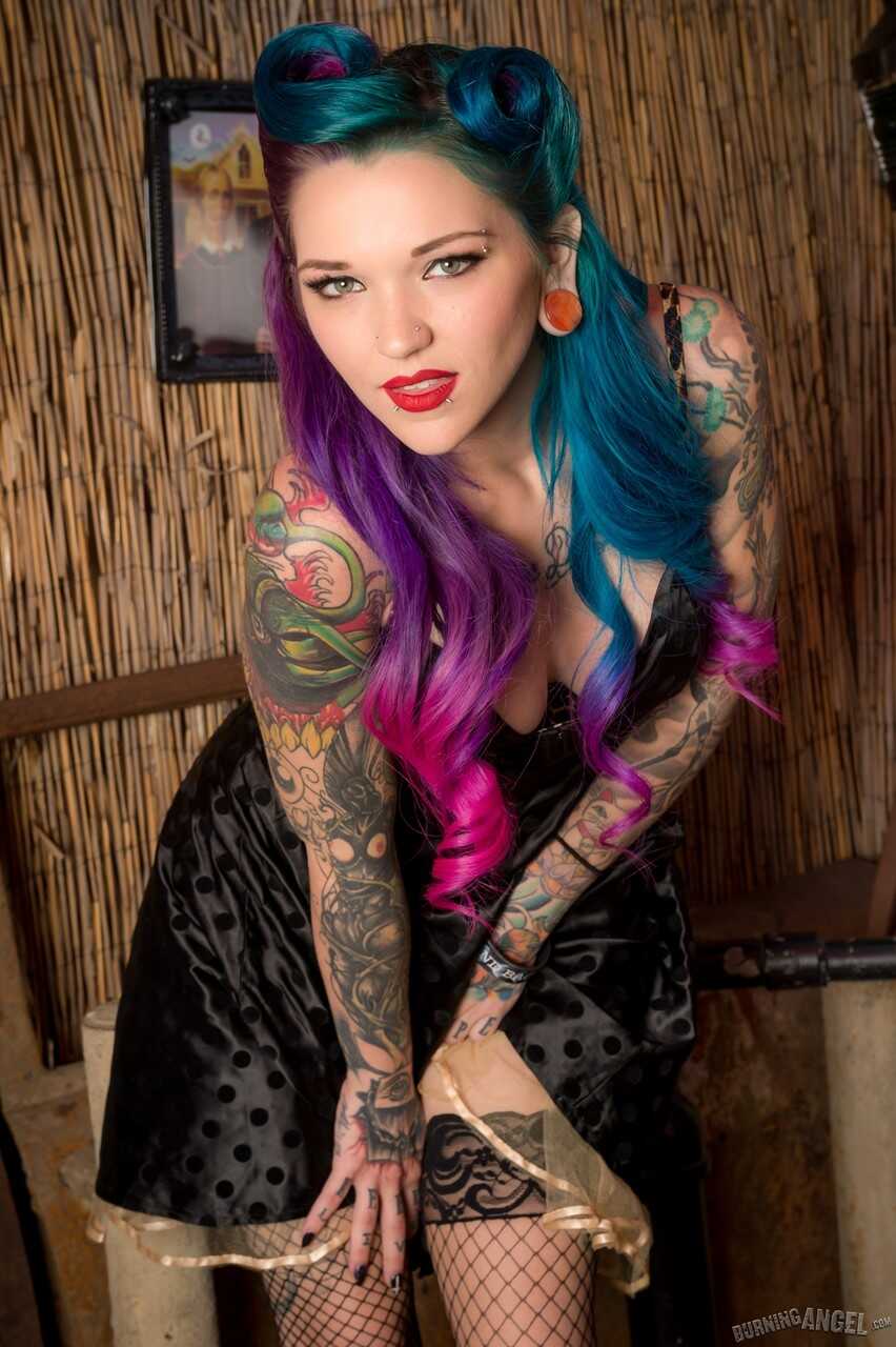 Tattooed Kandy Kummings in heels and fishnet stockings spreading her ass for your pleasure - Kandy Kummings