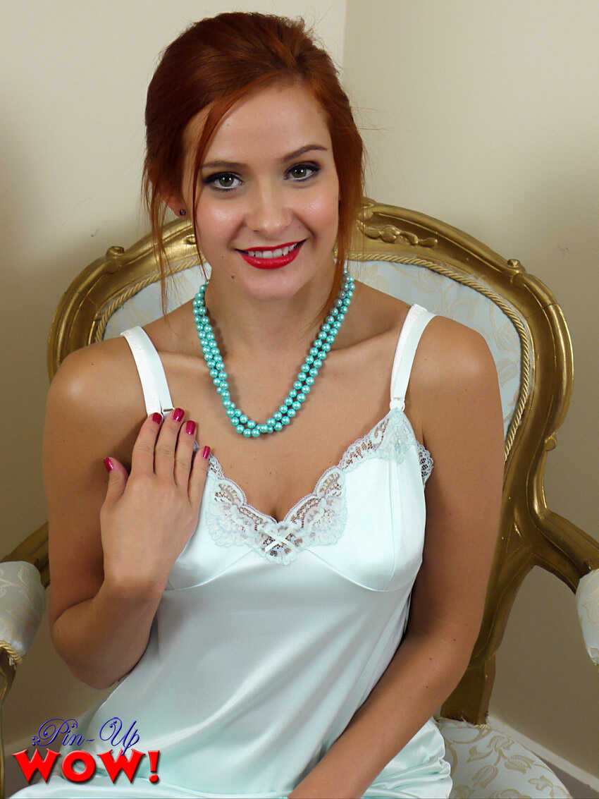 Redhead vintage babe Elle Richie strips down to her girdle and teases you with her big tits in retro lingerie! - Elle Richie