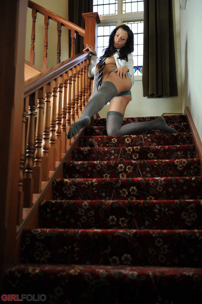 Naughty schoolgirl Tess strips out of her wet panties to expose her succulent slit in thigh high socks and tie. - Tess