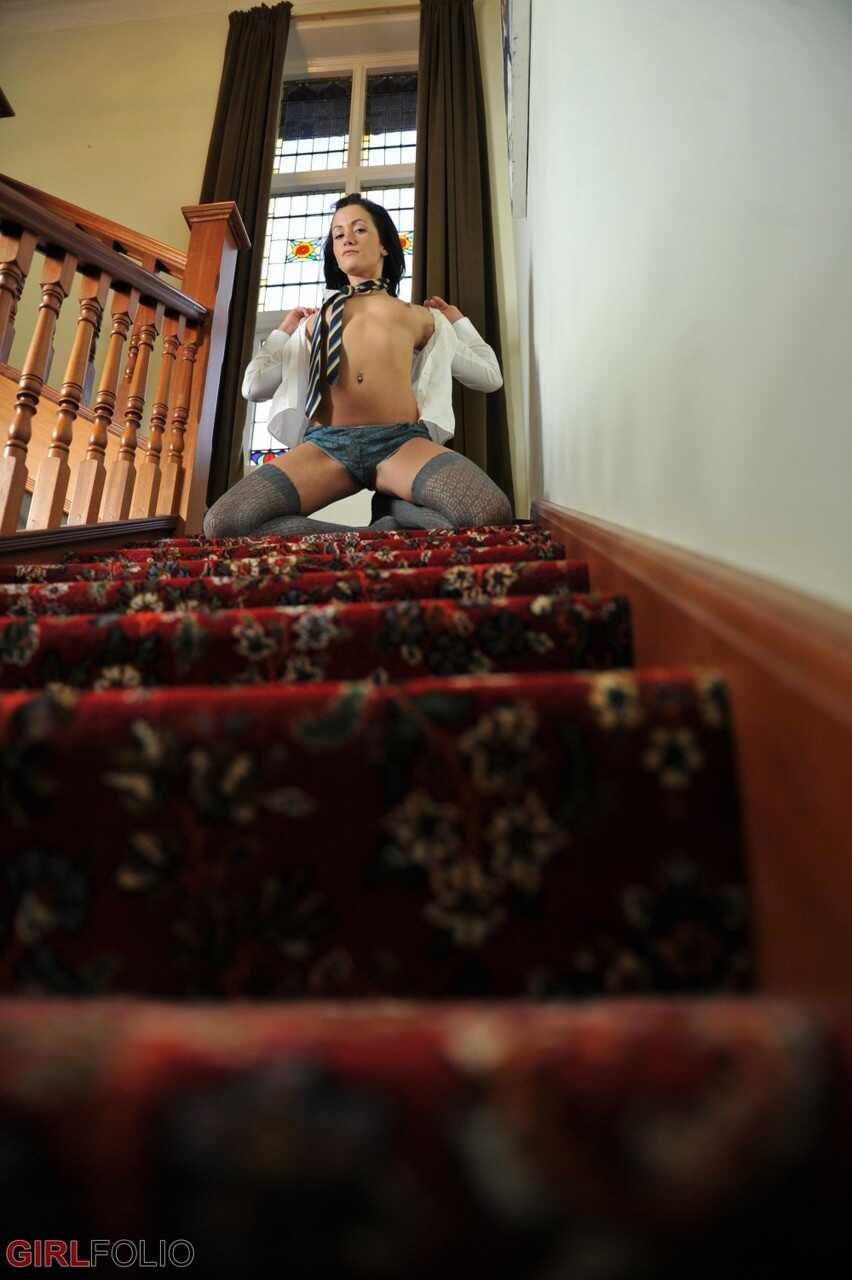 Naughty schoolgirl Tess strips out of her wet panties to expose her succulent slit in thigh high socks and tie. - Tess