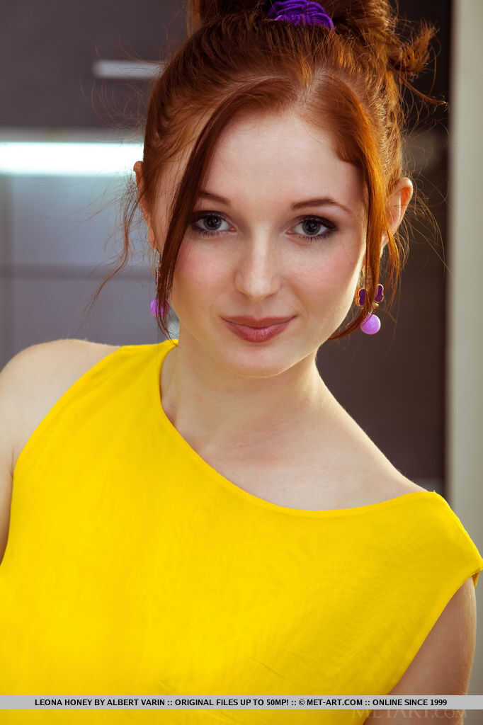 Redheaded teen babe Leona Honey baring her tight ass and perfect pussy for the glamorous camera. - Leona Honey