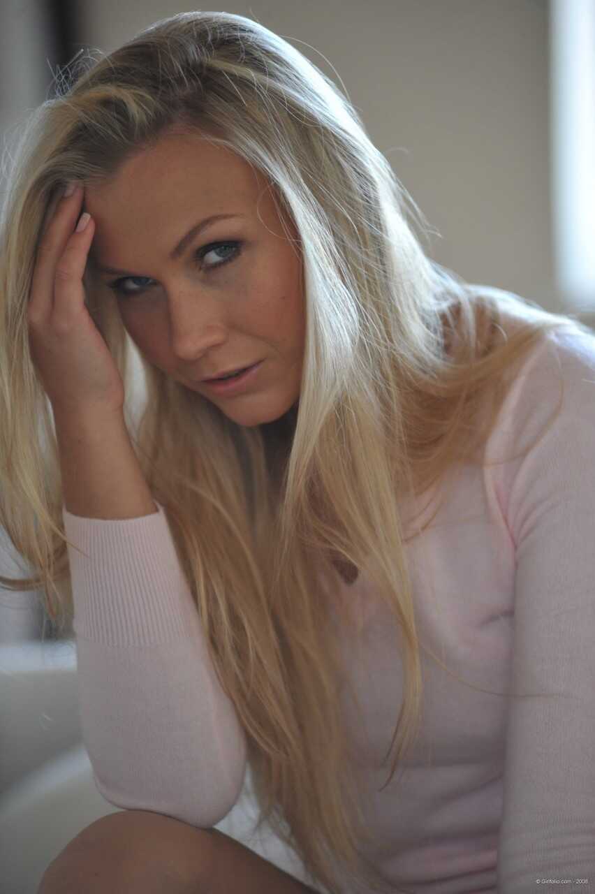 Blonde model Lizzy Merova in blue jeans and heels heads indoors to pose in the nude for a dirty ass shot. - Lizzy Merova