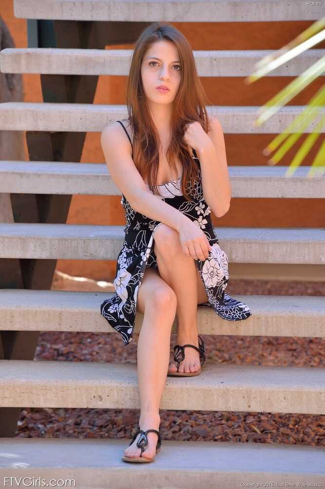 Brunette teen spreads her legs and plays with her ass in the great outdoors while toying with her panties - 
