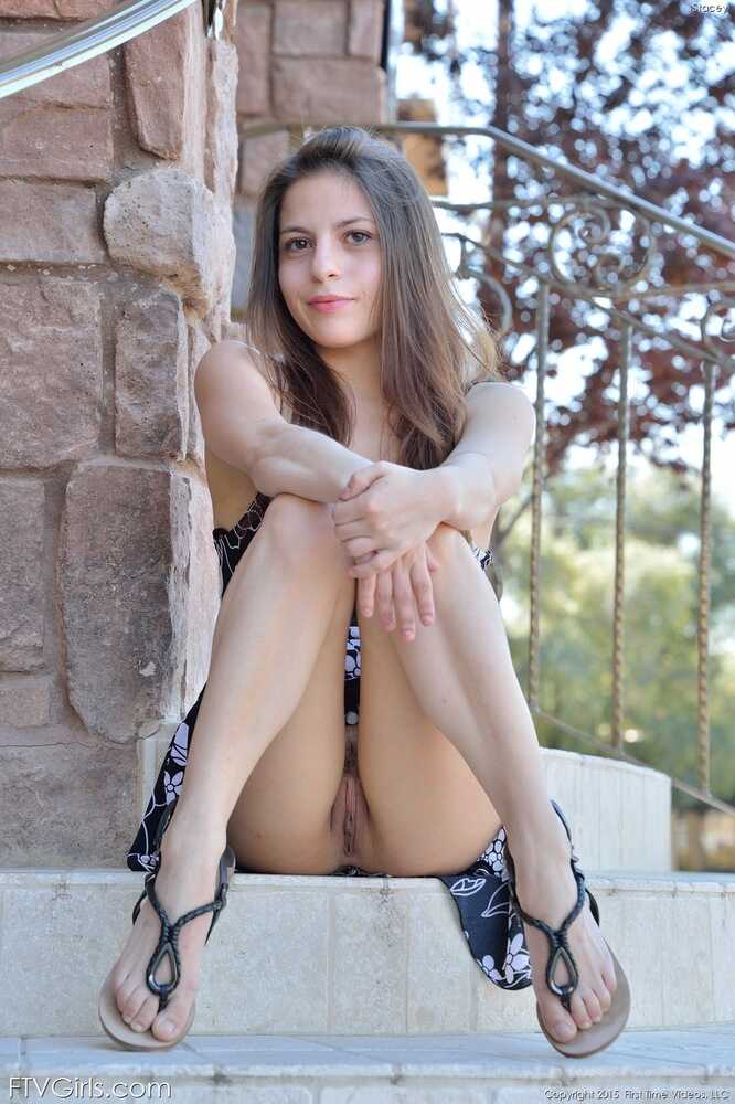 Brunette teen spreads her legs and plays with her ass in the great outdoors while toying with her panties - 