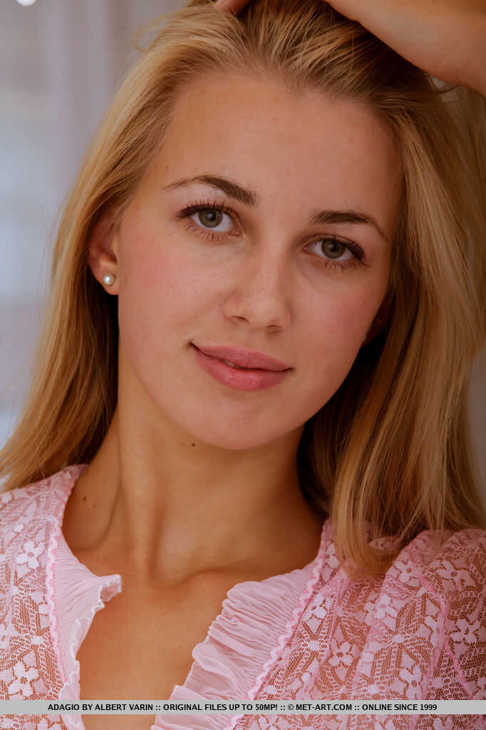 Tall teen Adagio strips off her sheer lingerie and lounges on her bed completely nude - Adagio