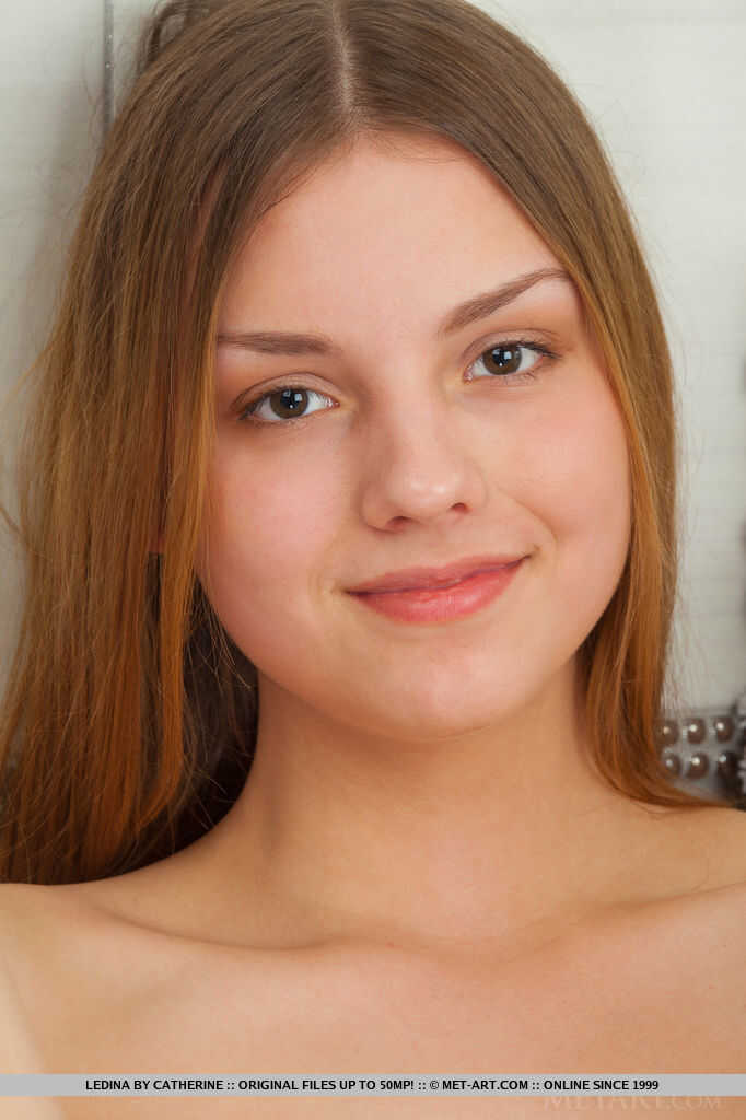 Redheaded babes spreading their shaved vaginas in the bathroom Ledina's big teen legs - Ledina