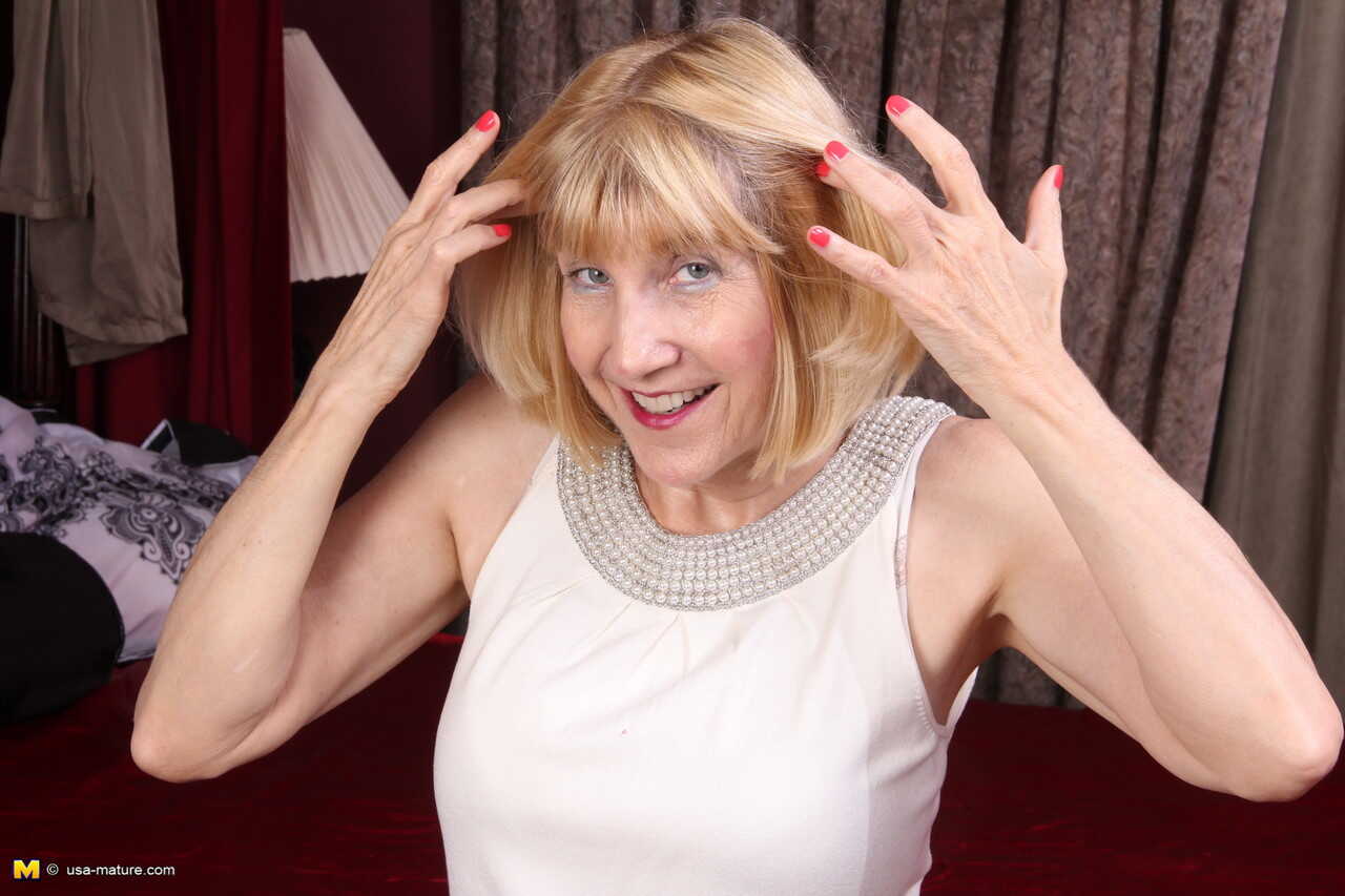 Mrs. Bossy Ryder undressing to show off her sassy body and nice breasts - Bossy Ryder
