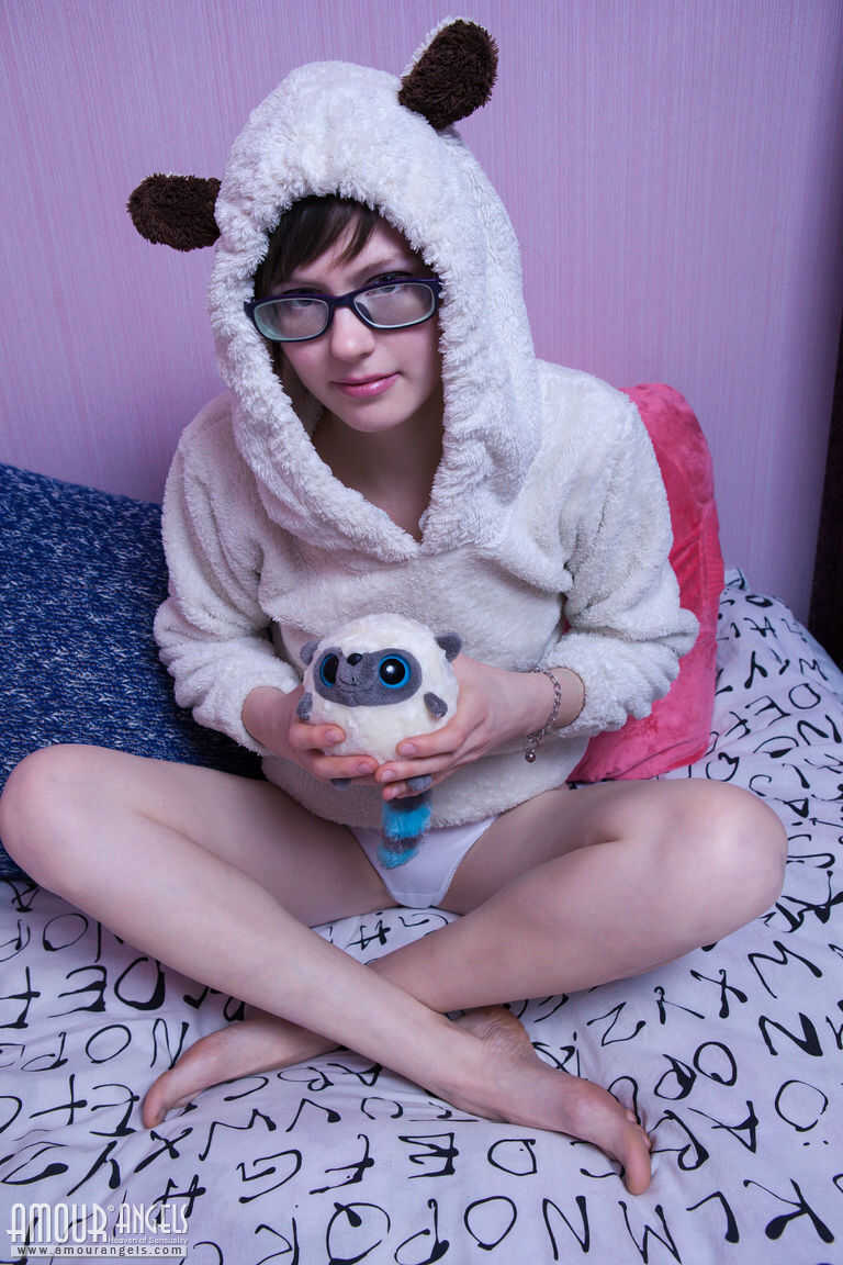 Thin teen showcases her gaping vagina and anus on her bed with nerdy panties down - Olesya