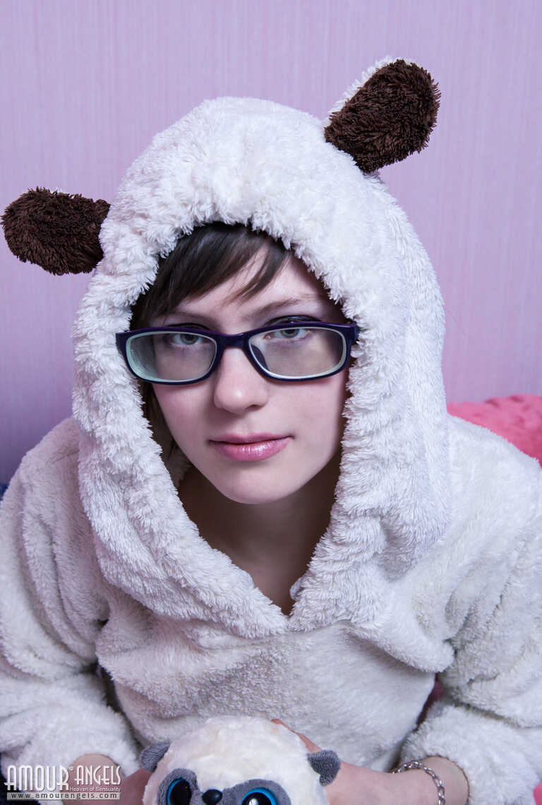 Thin teen showcases her gaping vagina and anus on her bed with nerdy panties down - Olesya