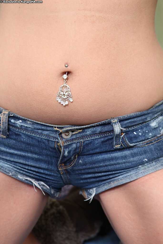 Brittany shows off her pierced belly in tight jean shorts before riding a hard cock with her beautiful ass in the air. - B...