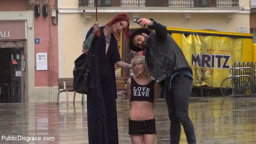 Rainy Day Embarrassment: Nora Barcelona Gets Flogged in the Streets by Strangers!