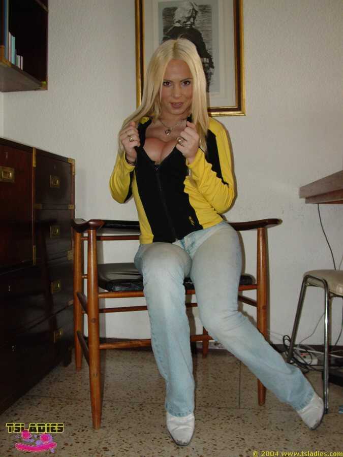 Blonde TS Lady Spreading Her Ass For A Shemale Cumshot, While Wearing A Pair Of Jeans And Displaying Her Huge Cock! - 