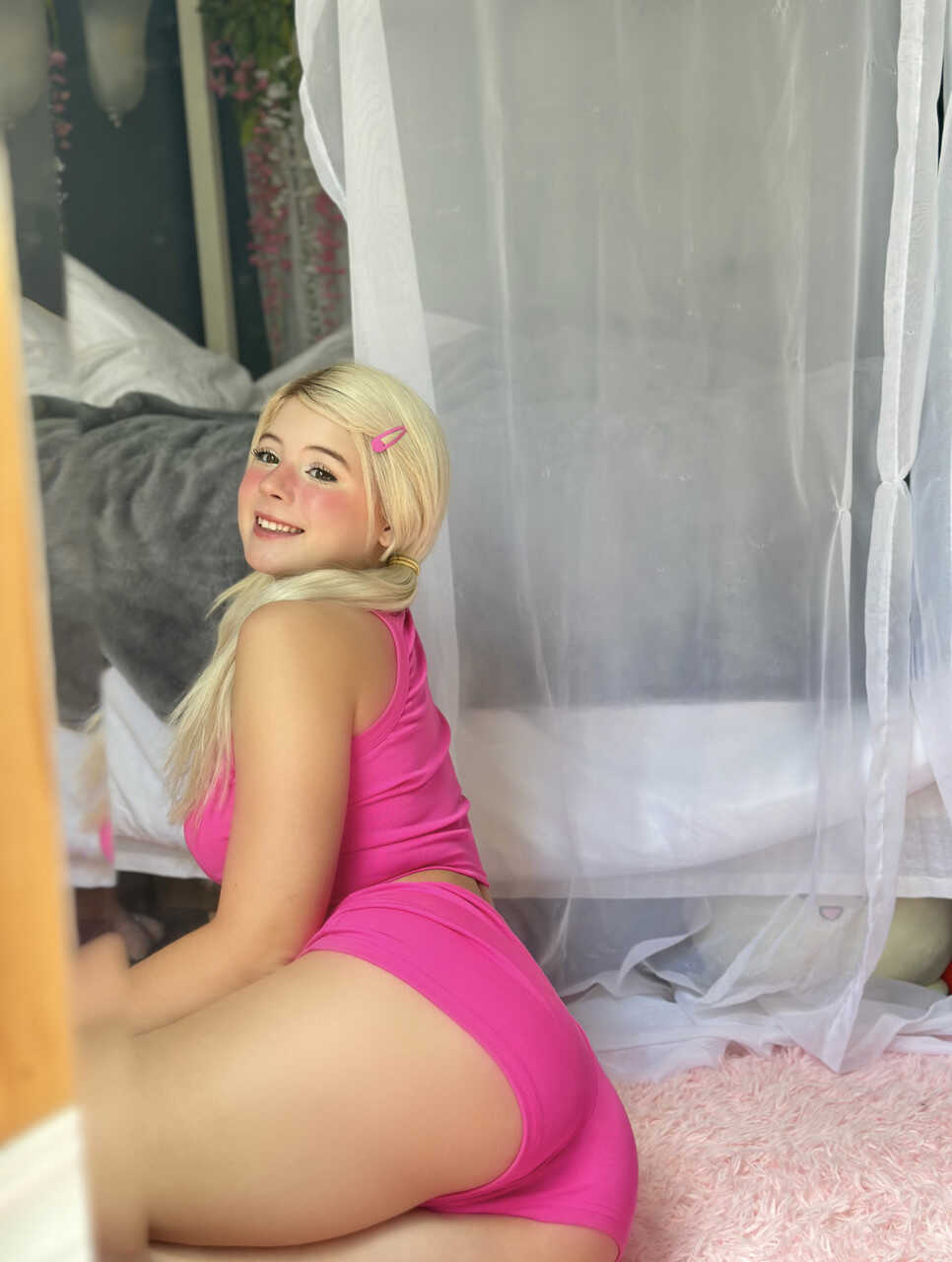 Blonde OnlyFans cam babe Yumi Bumsy flaunts her big ass in a sexy compilation of mirror selfies, homemade solo action and ...