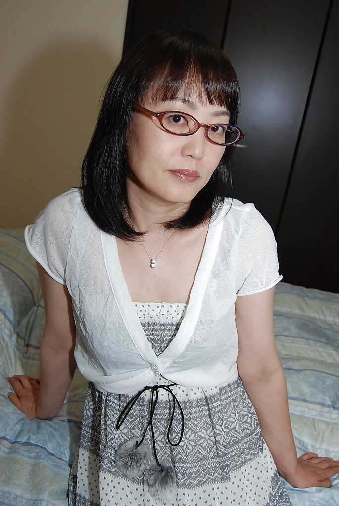 Shy Asian Lady in Glasses Explores Her Inner Sex Goddess with Vibrating Toy