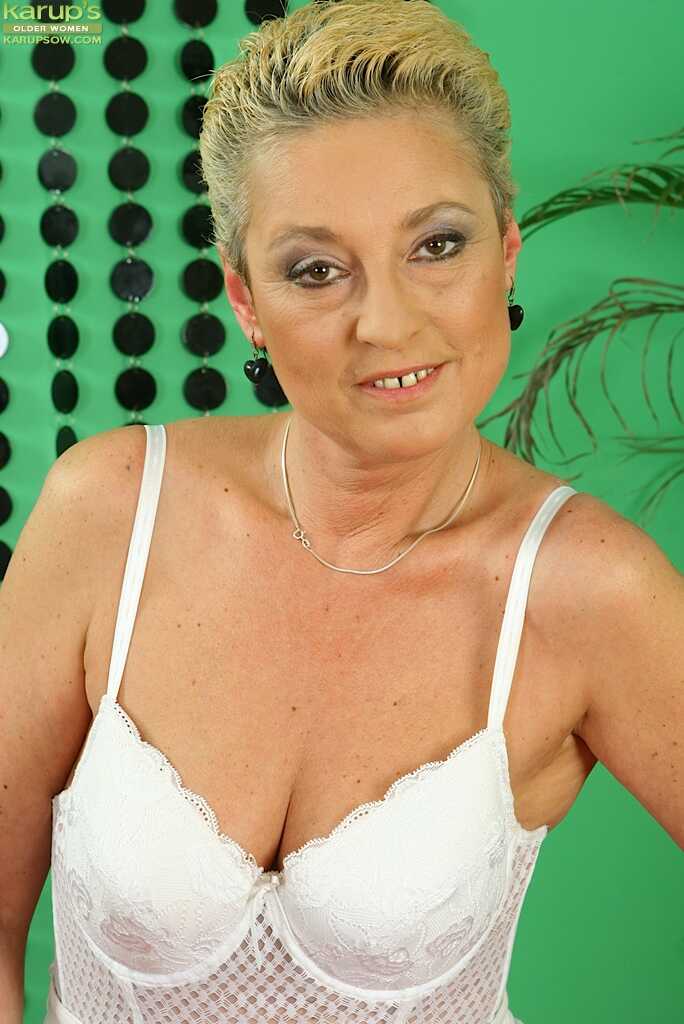 Blonde Short-haired Mature Lassie in Nylons Revealing Her Tits and Trimmed Gash - Bettany