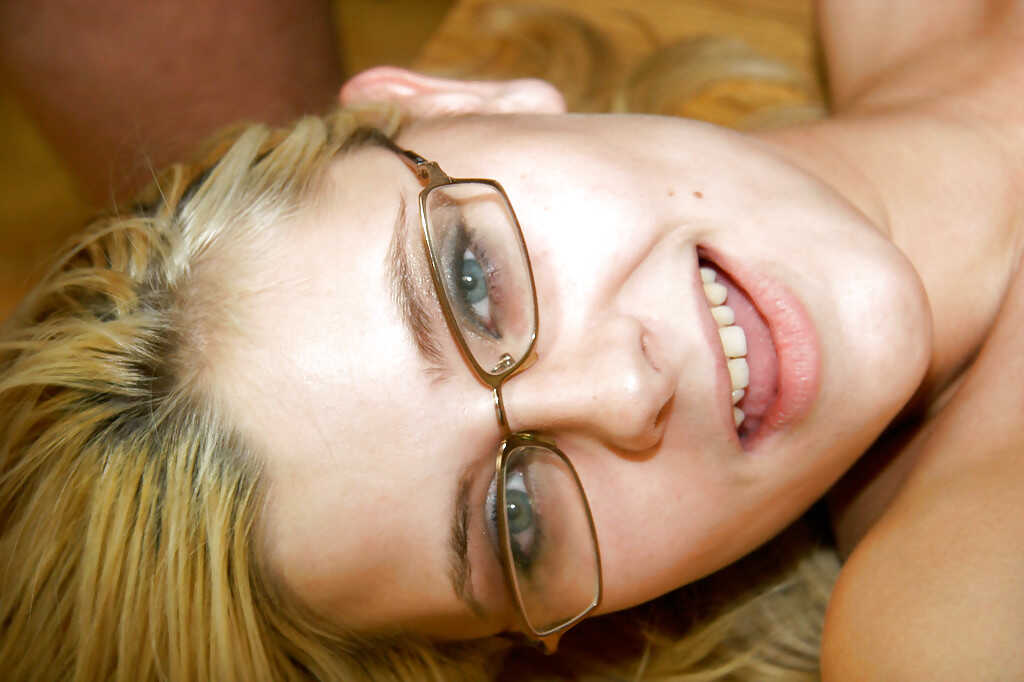 Salacious blonde with saggy jugs in glasses gets gangbanged and facialized by three horny men while wearing a sexy red dre...