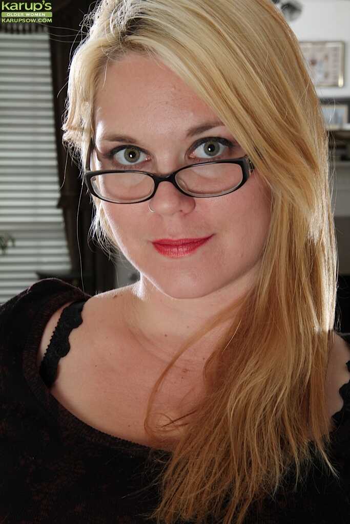 Fatty Milf in glasses Lindsay Jackson is undressing on camera Lindsay Jackson's big fat ass and tits get exposed for ...