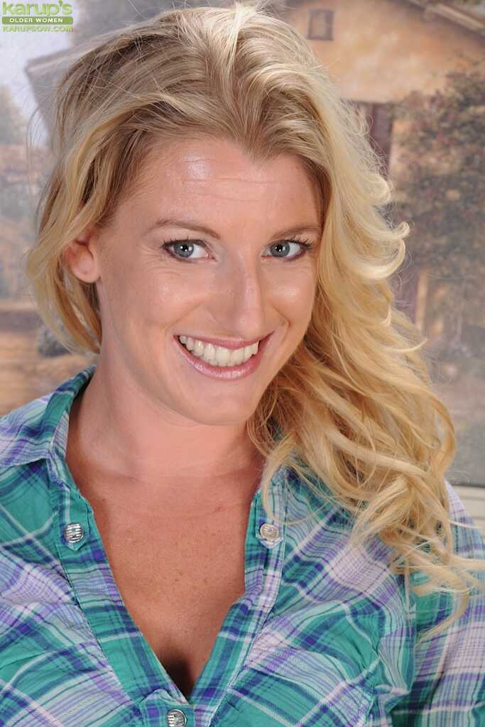 Blonde slut Avona Dominica is spreading her ass wide open while showing off her big tits and feet. - Avona Dominica