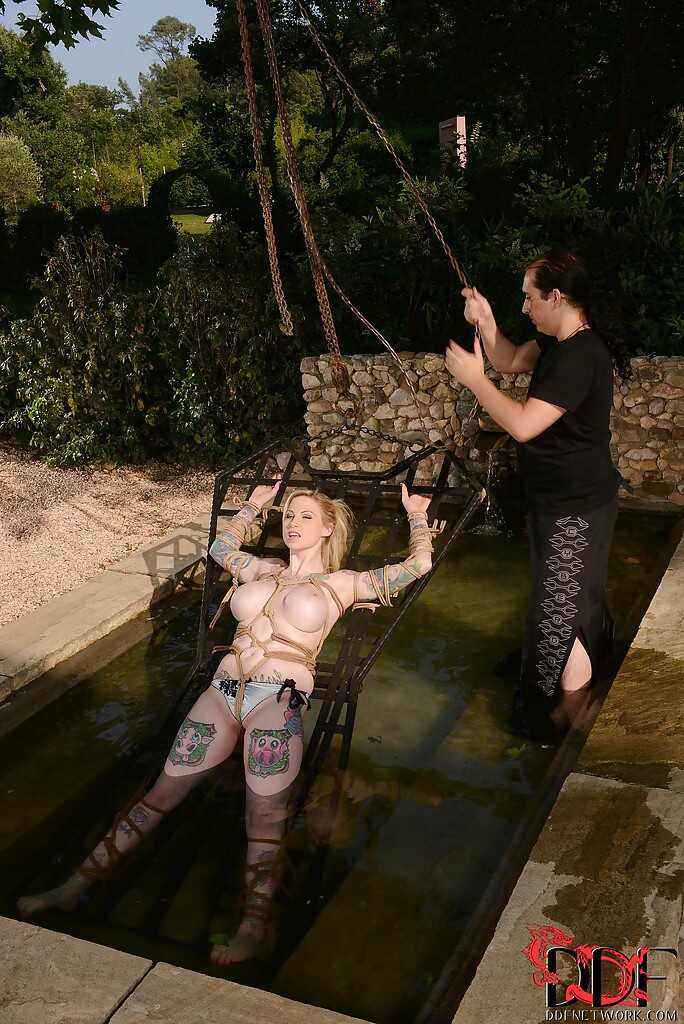 Jolly babe with big tits Hollie Hatton getting tied up and ravished outdoors by her neighbor while showing off her wet tit...