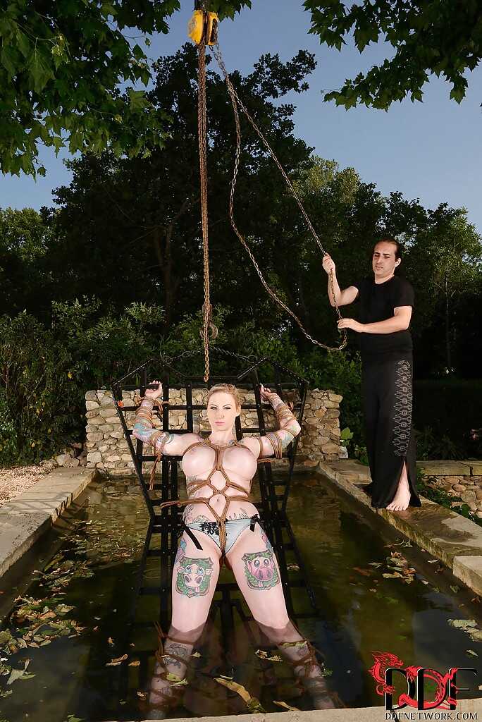 Jolly babe with big tits Hollie Hatton getting tied up and ravished outdoors by her neighbor while showing off her wet tit...