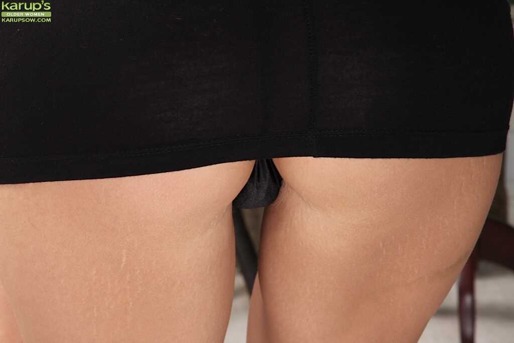 Slim babe Amy Johnson shows off her sexy asshole in black panties while sucking on a dildo for your viewing pleasure - Amy...
