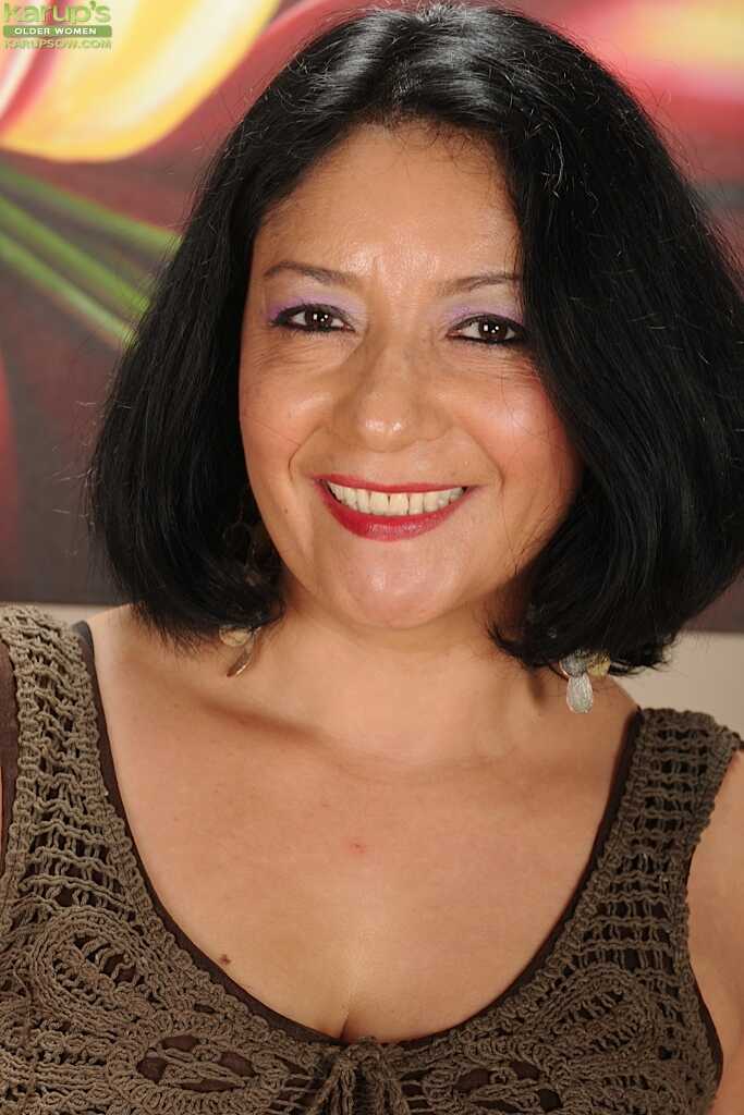 Isis Fajardo's Hard Nipples and Black Stockings ShowMature PAWG Isis Fajardo's Brunette Beauty with Shaved Pussy...