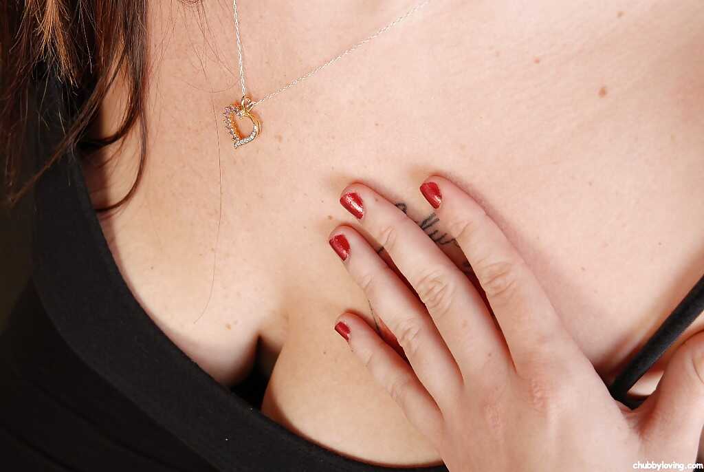 Chubby old woman with tattoos Velvet plays with her saggy boobs and licks her chocolate cake - Velvet