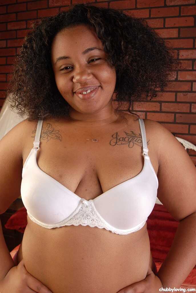 Curly-haired ebony diva Champagne shows off her thick booty and tiny tits in a mind-blowing solo performance - Champagne