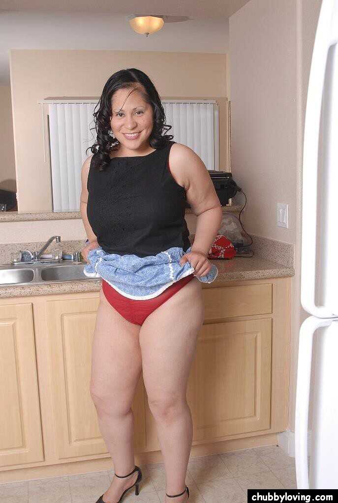 Mature Teedra poses in her sexy red lingerie while spreading her curvy thighs! - Teedra