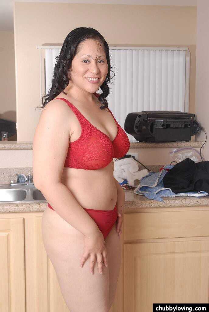 Mature Teedra poses in her sexy red lingerie while spreading her curvy thighs! - Teedra