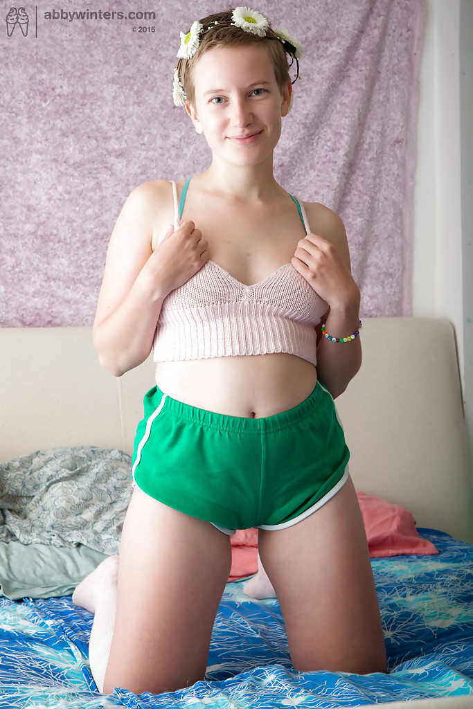 Short haired Zina strips off her athletic clothes for a hairy nude posing session. - Zina