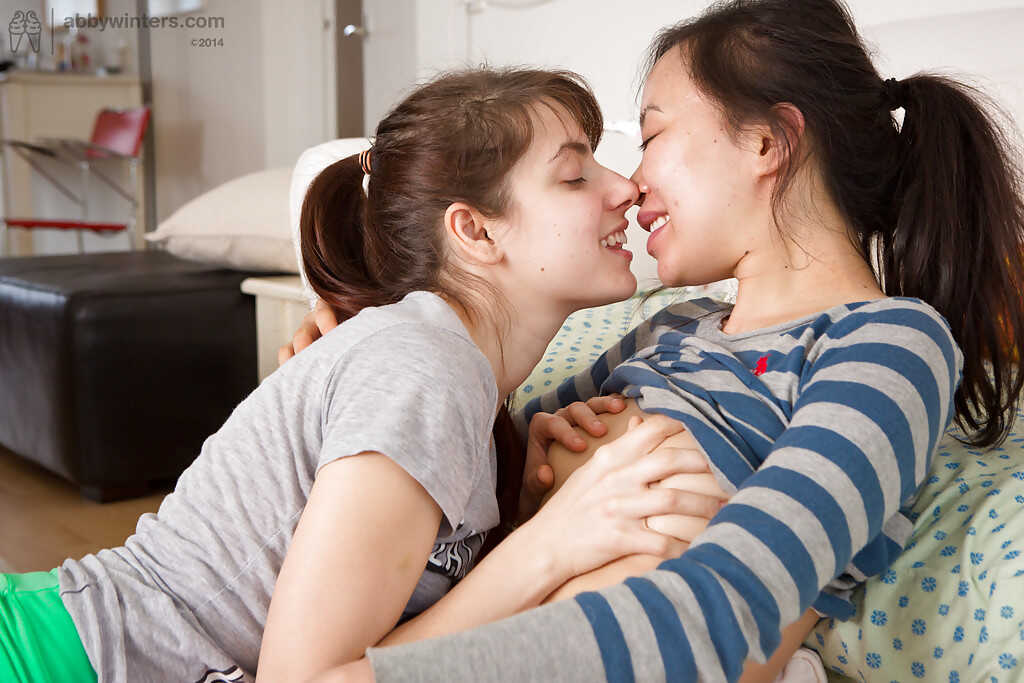 Janee and Sasha M go down on each other's Asian pussies while licking their nipples in a hot interracial lesbian thre...