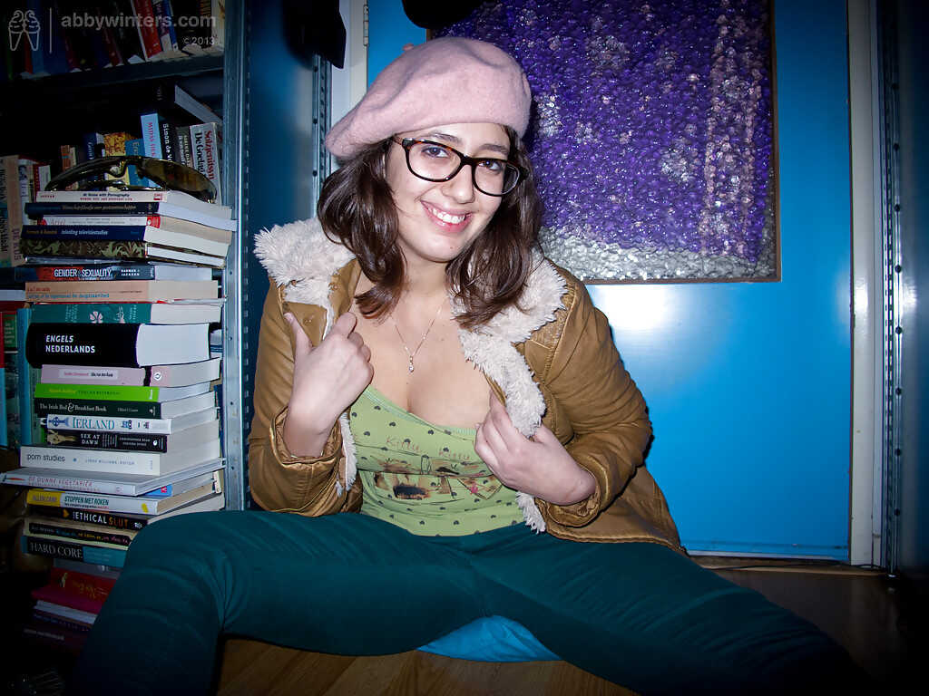 Naughty young Ariel D shows off her big natural tits and chubby figure in glasses - Ariel D
