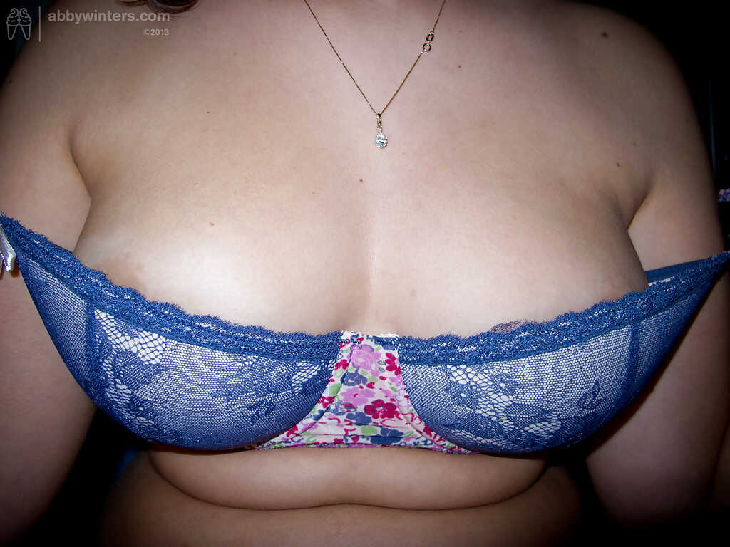 Naughty young Ariel D shows off her big natural tits and chubby figure in glasses - Ariel D