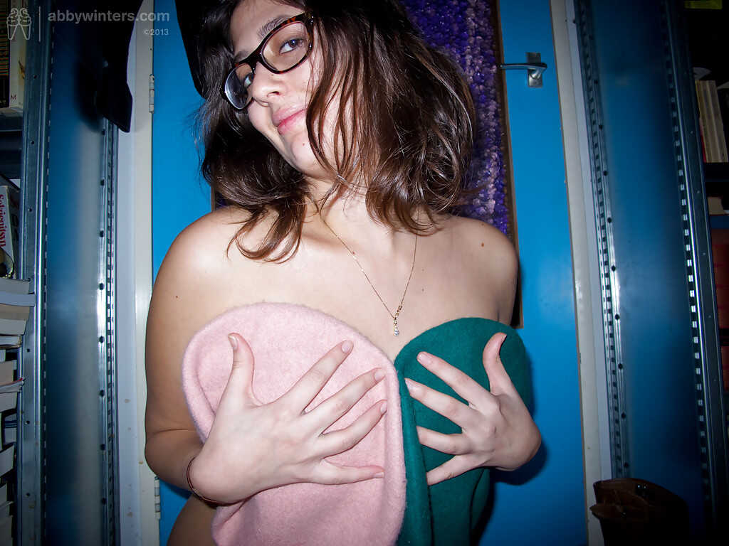 Naughty young Ariel D shows off her big natural tits and chubby figure in glasses - Ariel D