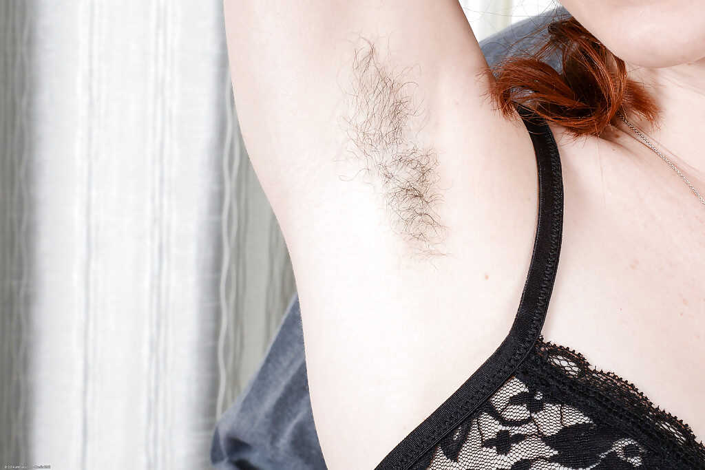 Redhead Amateur Emma Evins Taking a Condom-Covered Cock in Her Hairy Asshole - Emma Evins