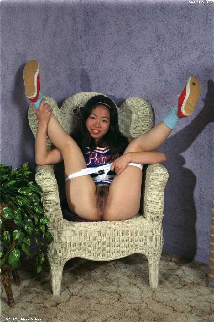 Ivy's Hairy Asian Cunt Exposed for the Camera: A Cheerleader's Naughty Secret Revealed! - Ivy