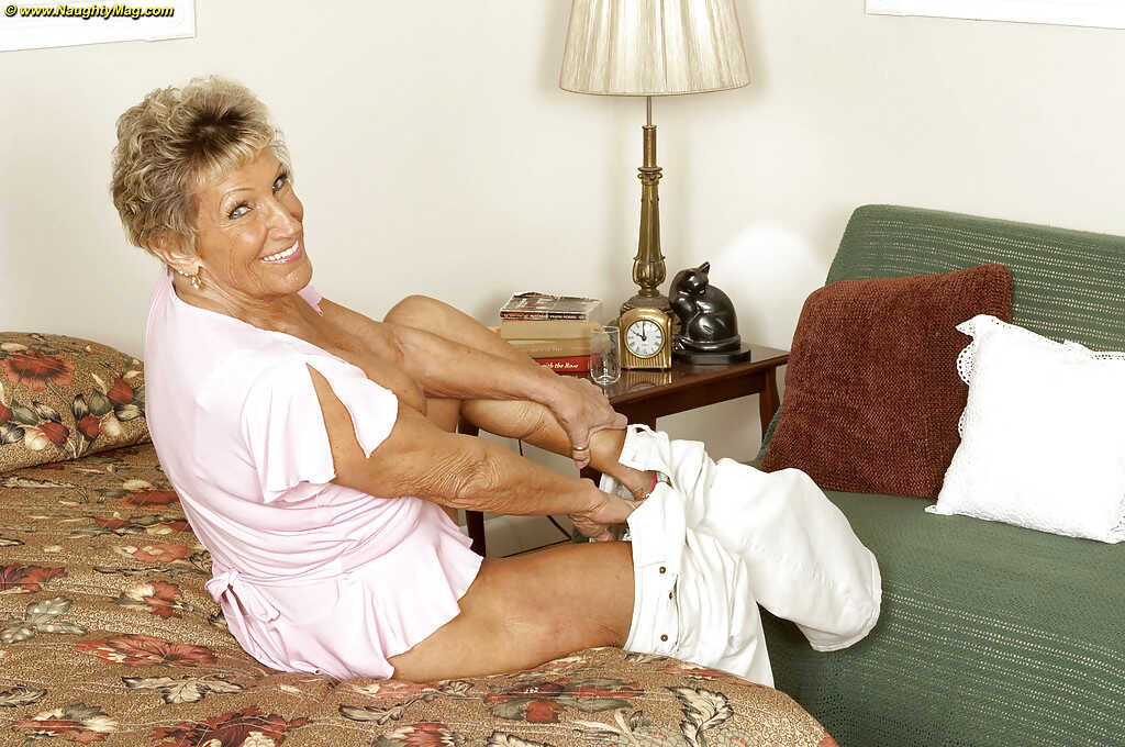 Busty granny Sandra Ann stripping off her lingerie and poses naked in high heels! - Sandra Ann