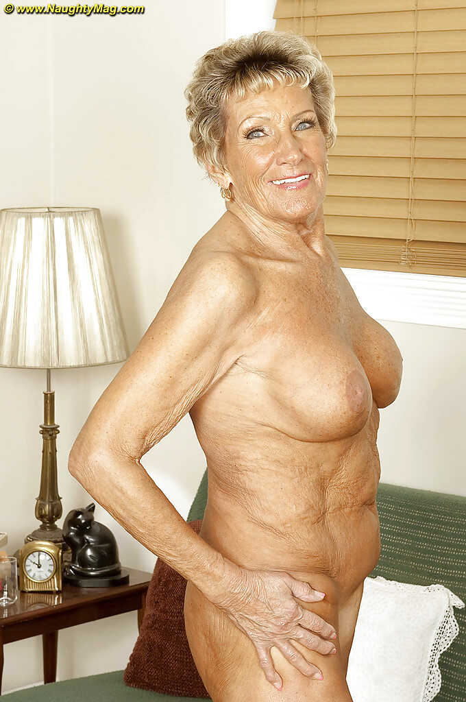 Busty granny Sandra Ann stripping off her lingerie and poses naked in high heels! - Sandra Ann