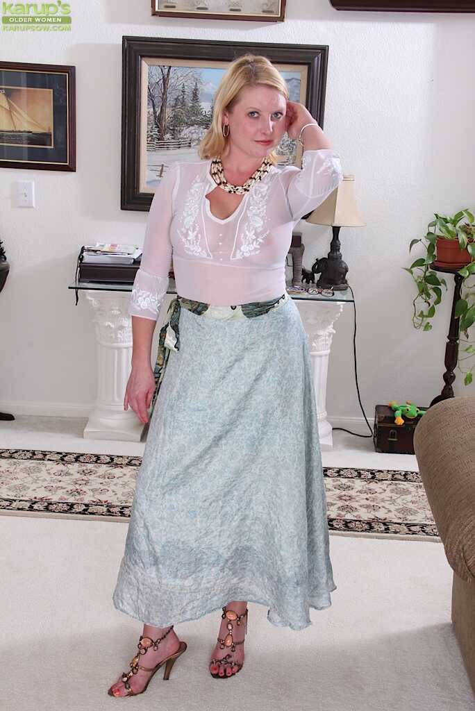 Lynn Miller's Hairy Snatch Spreads Wide Open While Undressing Her Mature Body with Big Tits and a Big Ass! - Lynn Miller