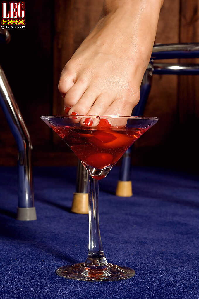 Brunette MILF with fake tits Krista Kaslo plays a foot fetish solo at the bar - Krista Kaslo