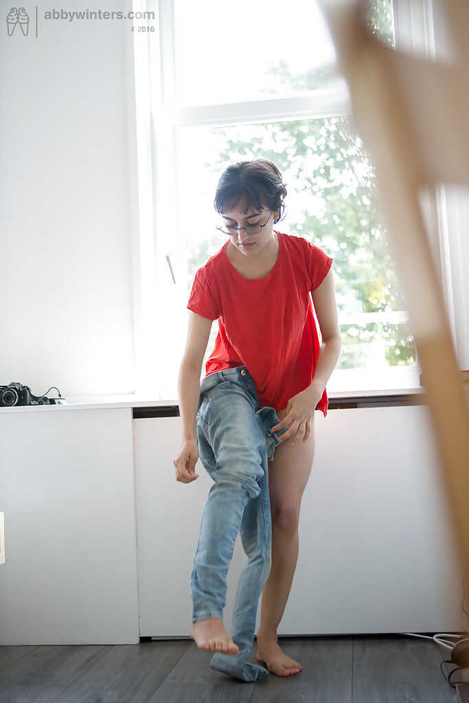 Skinny nerd Yasmeena slips into jeans and panties while exposing her saggy tits and hairy pussy - Yasmeena