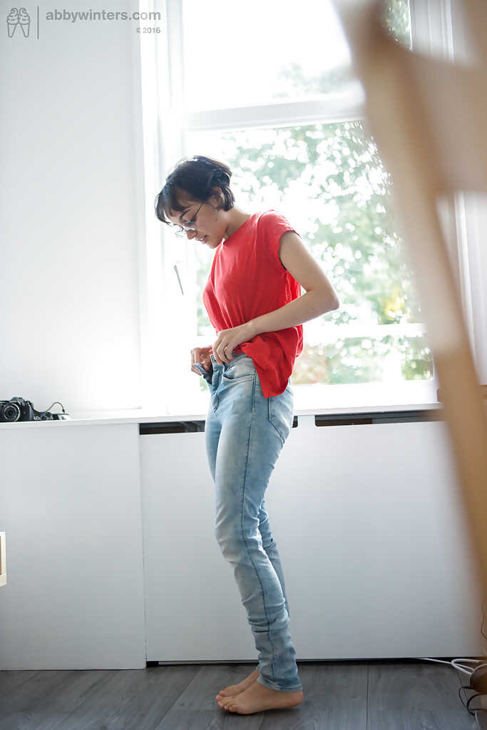 Skinny nerd Yasmeena slips into jeans and panties while exposing her saggy tits and hairy pussy - Yasmeena