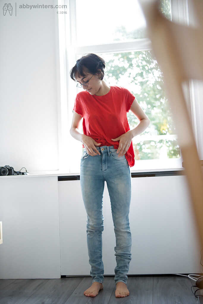 Skinny nerd Yasmeena slips into jeans and panties while exposing her saggy tits and hairy pussy - Yasmeena