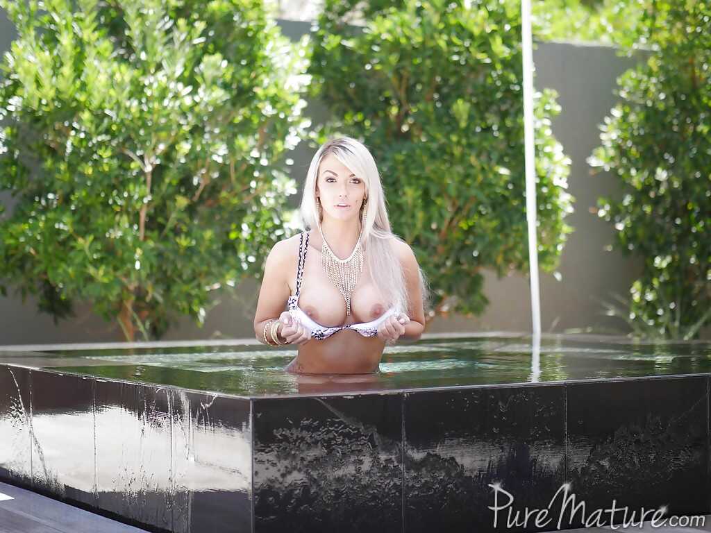 Jaw dropping Brooke Paige delights with a premium pool nude show, her big tits and round ass in full display! - Brooke Paige