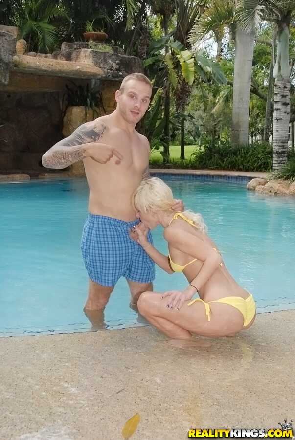 Blonde MILF Randi Tango Seduces Her Guy with a Bikini Blowjob in the Swimming Pool - Randi Tango