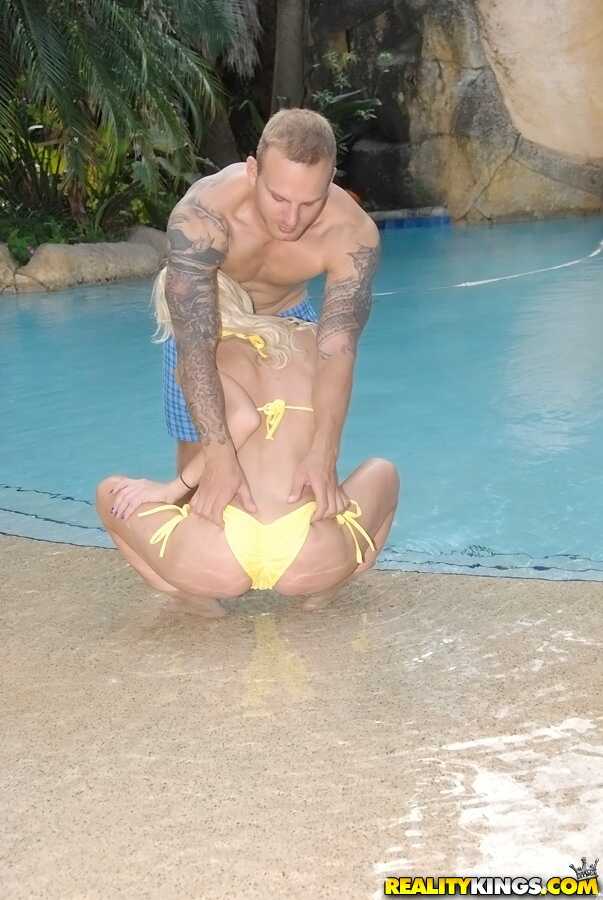 Blonde MILF Randi Tango Seduces Her Guy with a Bikini Blowjob in the Swimming Pool - Randi Tango