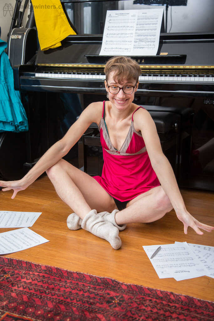 Thin amateur with short hair and glasses shows off her beaver on a skinny nerd's piano bench - Gretchen