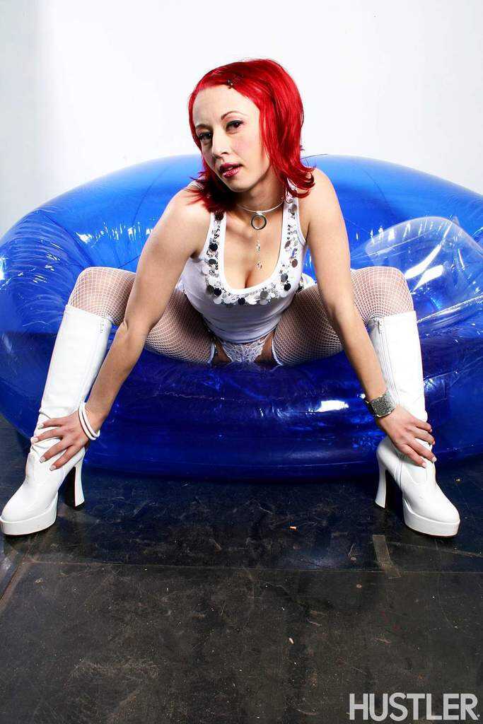Redhead MILF Sabrina Sparx spreads her legs wide open in mesh hose and boots for a steamy solo session - Sabrina Sparx